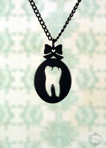 Sweet Tooth Cameo Bow Necklace in black stainless steel