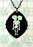 Conjoined Siamese Twins Necklace in black stainless steel